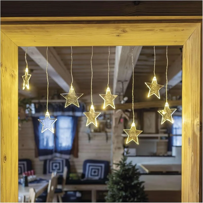 Besuche den EMOS-Store EMOS Mini Lichtervorhang mit 8 Sternen, LED-Lichterkette 84cm mit Sternen, Warmweiß, Lichtergirlande + Netzteil, Leuchtdauer 10.000 h, IP44 für Innen und Außen, für Party, Weihnachten, Deko — Weihnachtsbeleuchtung