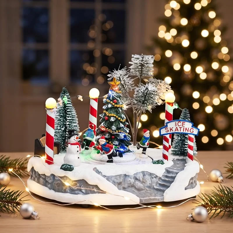 Marke: Candieslife Candieslife Musikalische Weihnachtsdorf-Eisbahn-Dekoration, beleuchtete animierte Tisch-Winterszene mit Baum, Schneemann, Nordpolbogen und Skatern für Kaminregal, Urlaubsdekoration — Weihnachtsdeko