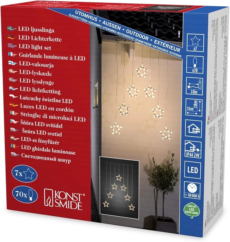 Besuche den Konstsmide-Store Konstsmide LED Lichtervorhang mit 7 Sternensilhouetten, Maße Sterne: B: 18 cm, H: 18, 5 cm, 70 warm weiße Dioden, 24V Außentrafo, transparentes Kabel - 4043-103 — Weihnachtsbeleuchtung