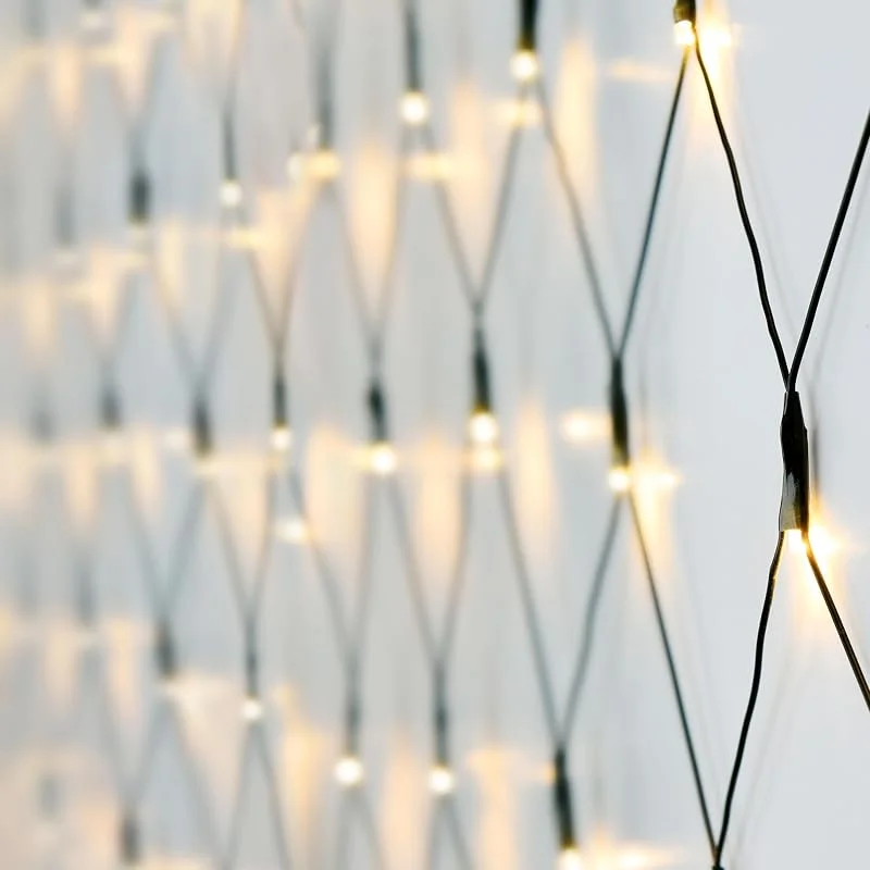 Besuche den Spetebo-Store Spetebo Lichternetz 1, 5x1, 5 m - 100 LED warmweiß - Batterie betrieben + Timer Funktion - Deko Lichterkette Netz Außen — Weihnachtsbeleuchtung