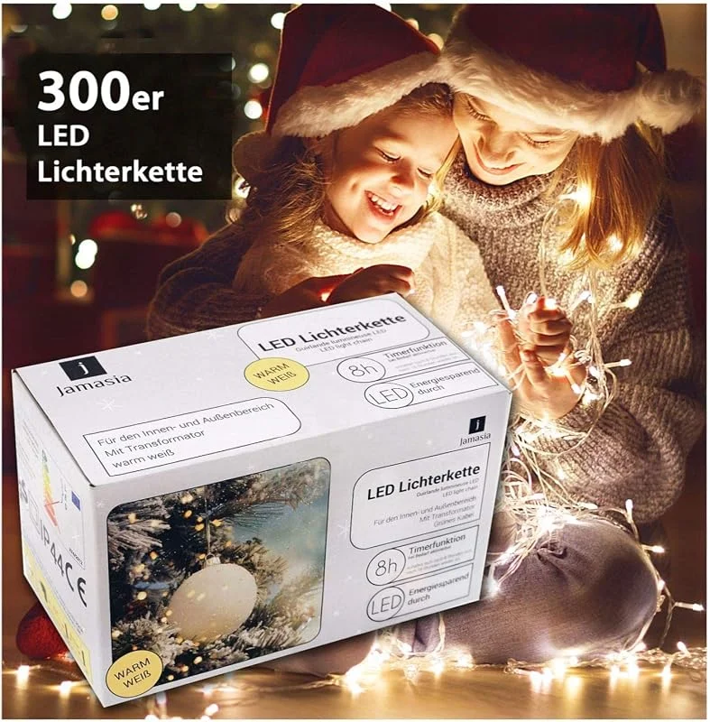 Marke: Jamasia 999104 - LED Lichterkette mit 300 LED Lämpchen, warm weiß, mit Trafo und 8 Stunden Timerfunktion, für Innen und Außen, grünes Kabel Länge 37, 90 m, Zuführung 8 m, LED Abstand 10 cm, GS geprüft — Weihnachtsbeleuchtung